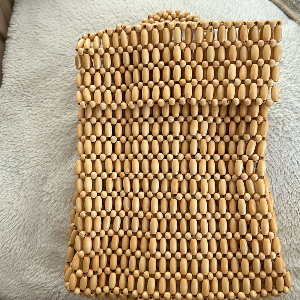 Natural wood beaded backpack